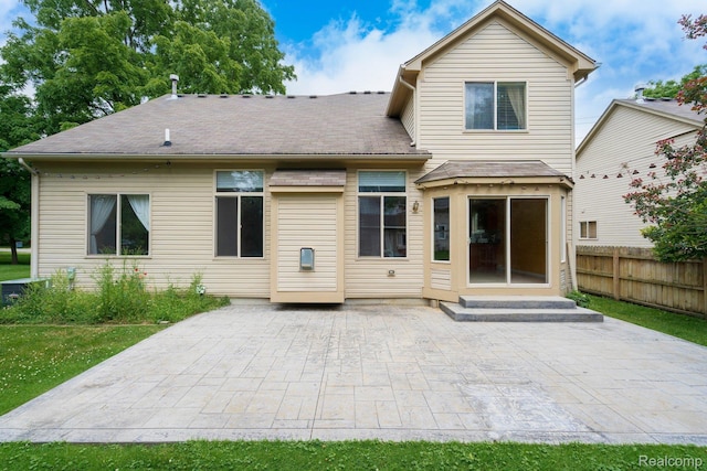 230 E Elizabeth St, Lake Orion, MI 48362 - rear view of property with a patio area and entry steps