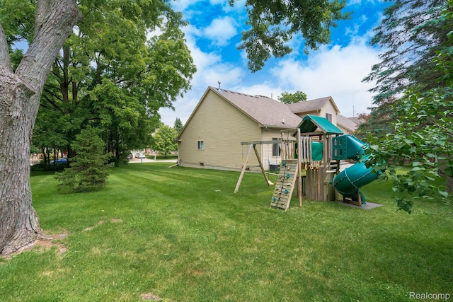 230 E Elizabeth St, Lake Orion, MI 48362 - view of grassy yard with a playground