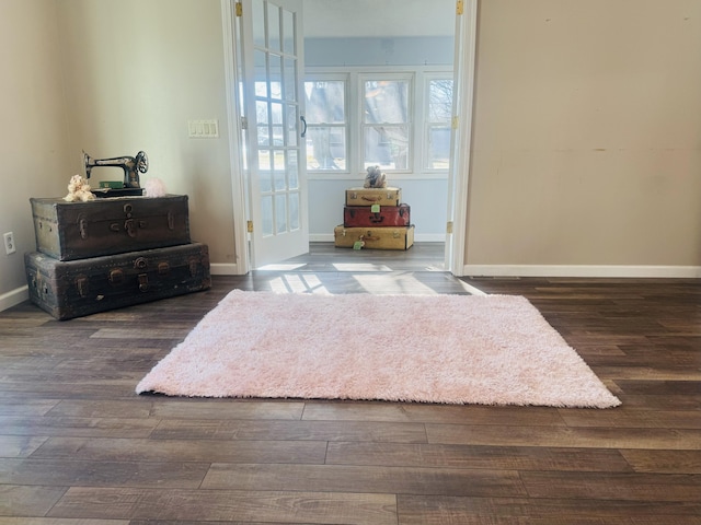 living area with dark wood-type flooring