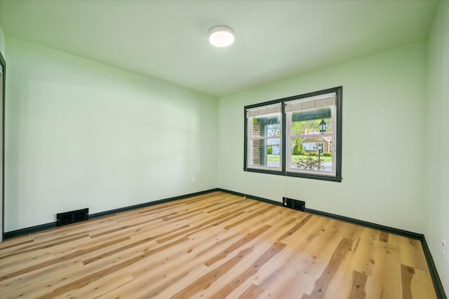 empty room featuring light wood-type flooring