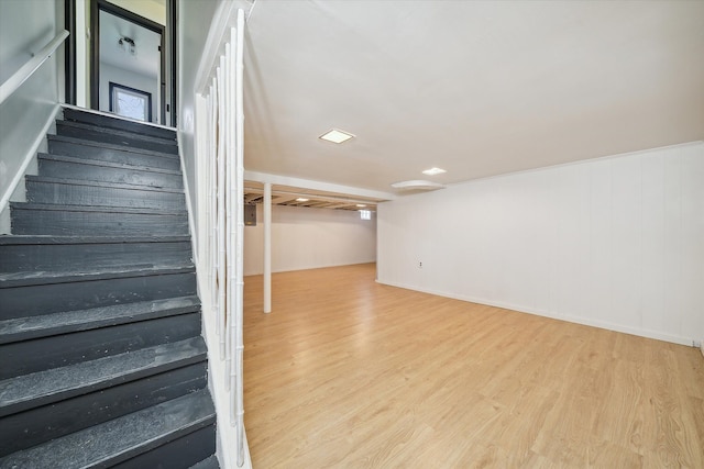 stairs with wood-type flooring