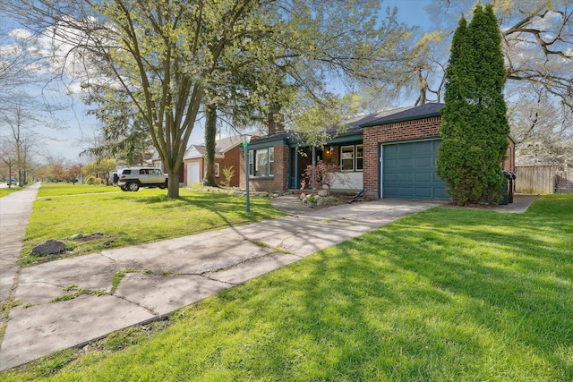 ranch-style house with a garage and a front yard