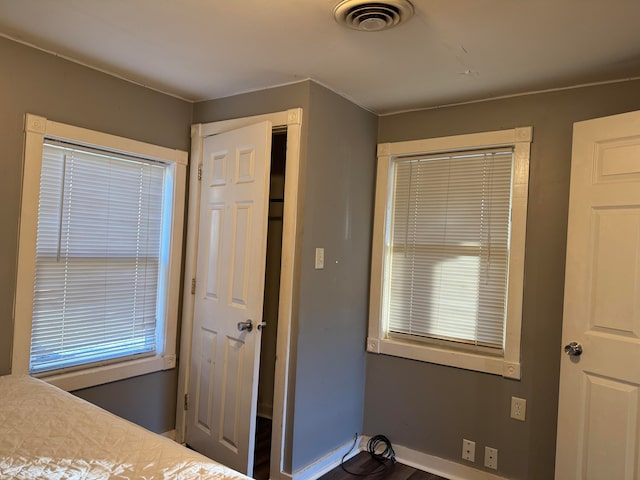 unfurnished bedroom featuring wood-type flooring