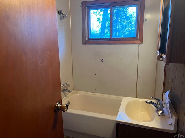 bathroom with vanity and shower / bath combination