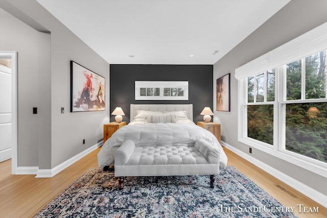 bedroom featuring hardwood / wood-style floors