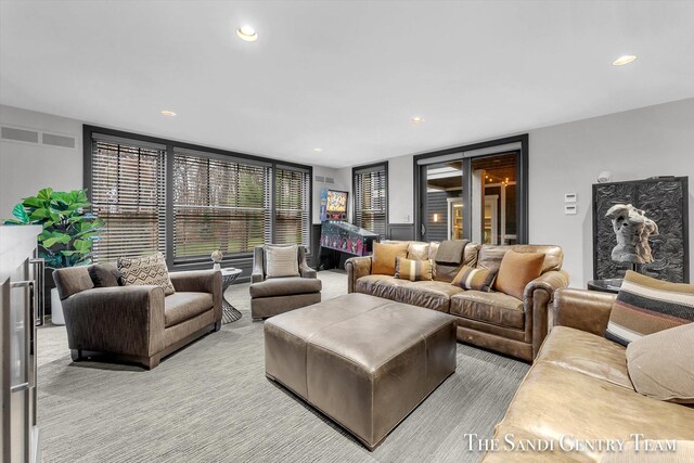 living room featuring light colored carpet