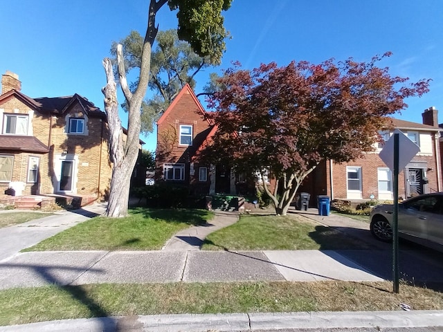 17366 Monica St, Detroit, MI 48221 - view of front facade with a front yard