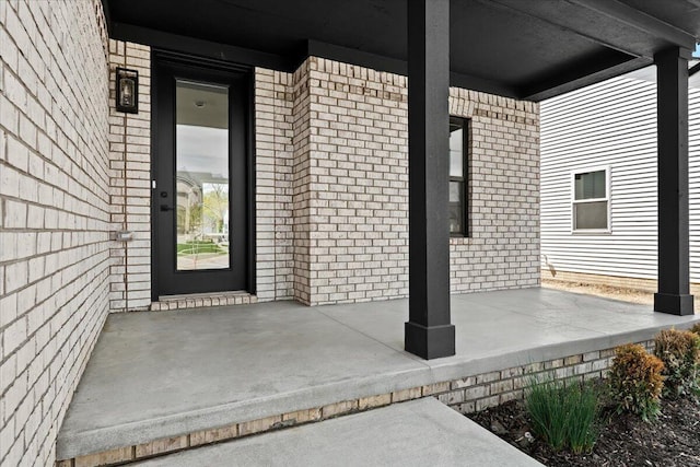 36135 Parkdale St Unit 5, Livonia, MI 48150 - entrance to property featuring brick siding and covered porch