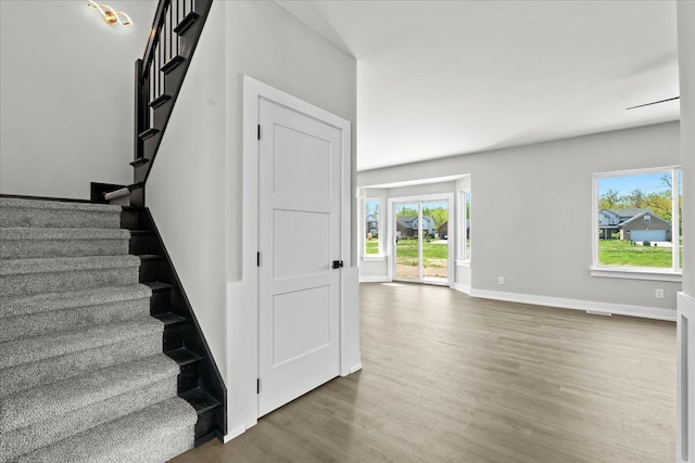36135 Parkdale St Unit 5, Livonia, MI 48150 - stairway featuring wood finished floors and baseboards