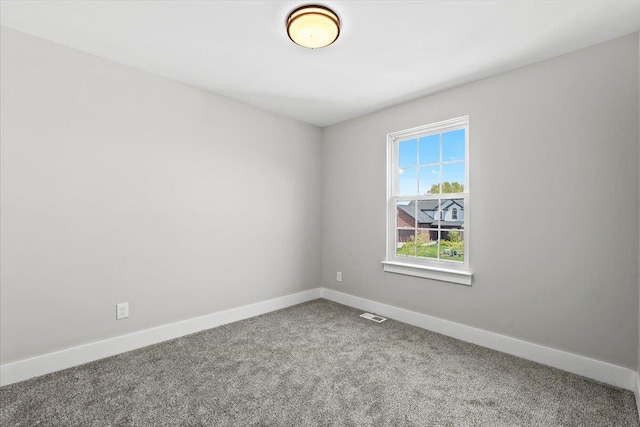 36135 Parkdale St Unit 5, Livonia, MI 48150 - carpeted spare room with baseboards