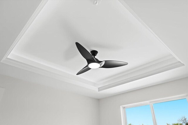 36135 Parkdale St Unit 5, Livonia, MI 48150 - detailed view of a tray ceiling, crown molding, and a ceiling fan