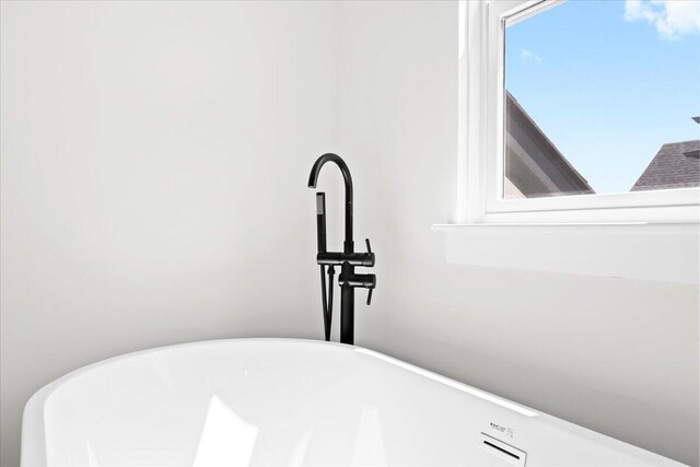 36135 Parkdale St Unit 5, Livonia, MI 48150 - bathroom view of a soaking tub and a sink