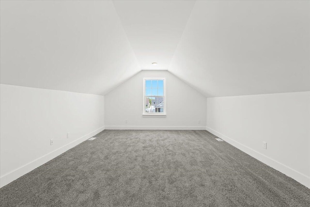 36135 Parkdale St Unit 5, Livonia, MI 48150 - bonus room with lofted ceiling, baseboards, and carpet flooring