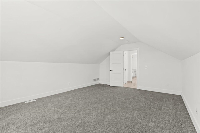 36135 Parkdale St Unit 5, Livonia, MI 48150 - bonus room featuring vaulted ceiling, carpet, and baseboards
