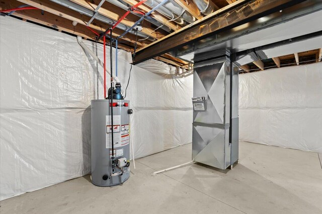 36135 Parkdale St Unit 5, Livonia, MI 48150 - unfinished basement with water heater and heating unit