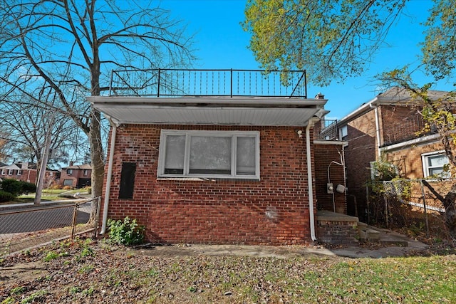 view of property exterior with a balcony