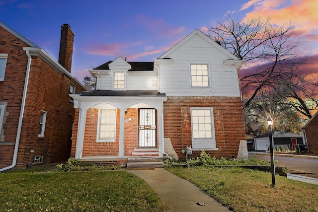 view of front of house with a lawn