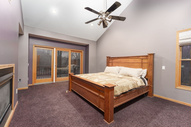 carpeted bedroom with ceiling fan and high vaulted ceiling