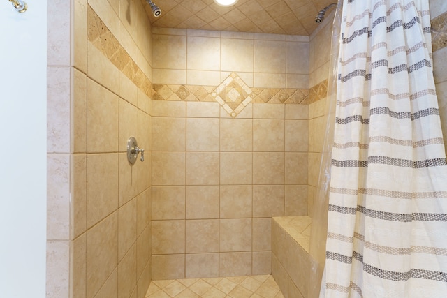 bathroom with a shower with shower curtain