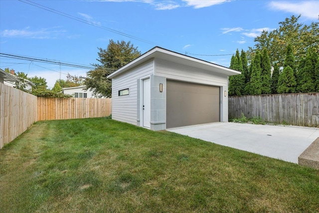 garage with a yard