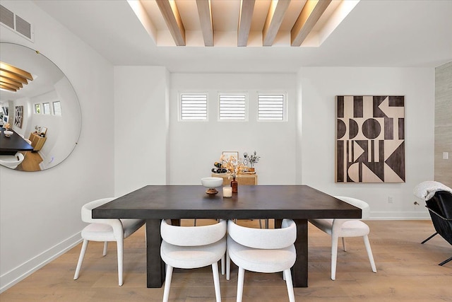 dining room featuring light hardwood / wood-style flooring