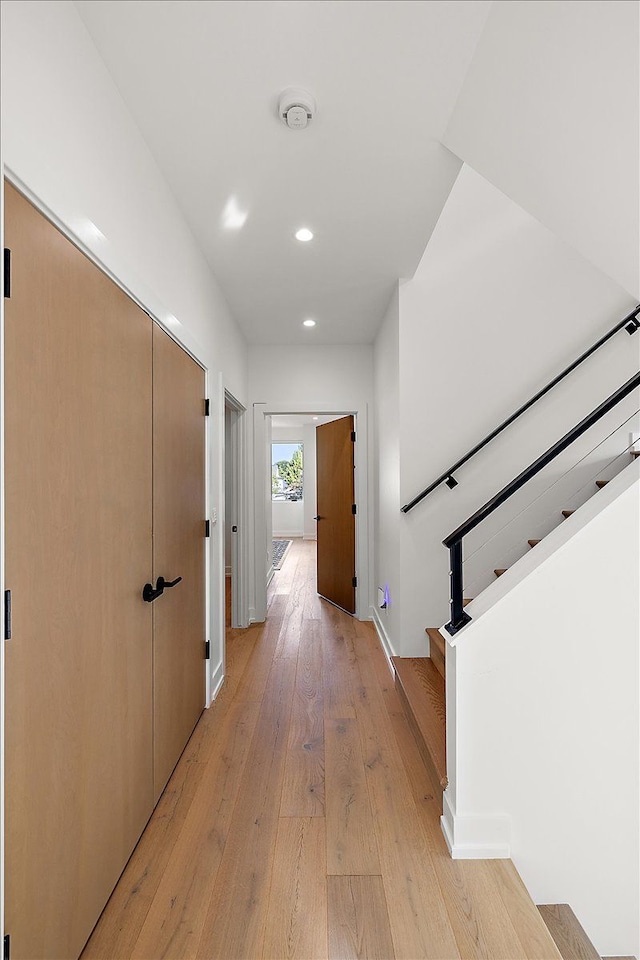 hallway with light wood-type flooring