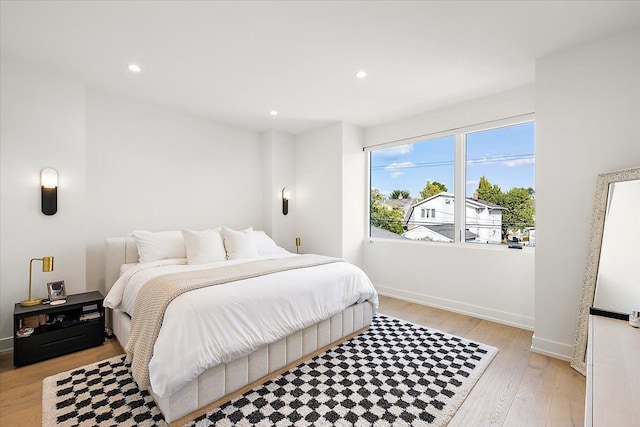 bedroom featuring light wood-type flooring