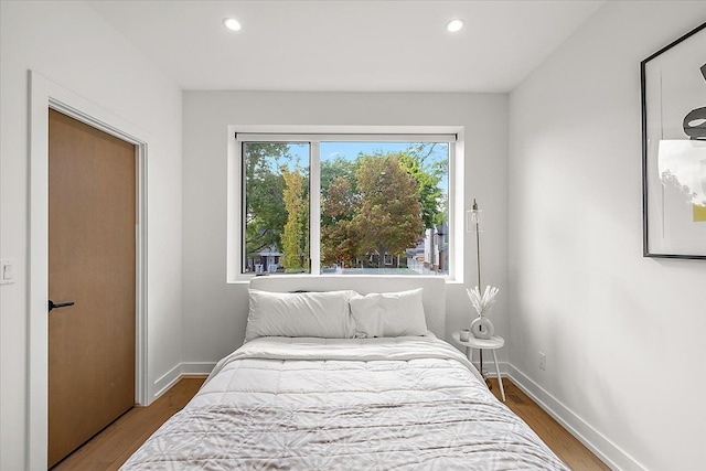 bedroom featuring wood-type flooring