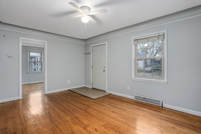 entryway featuring ceiling fan and light wood-type flooring