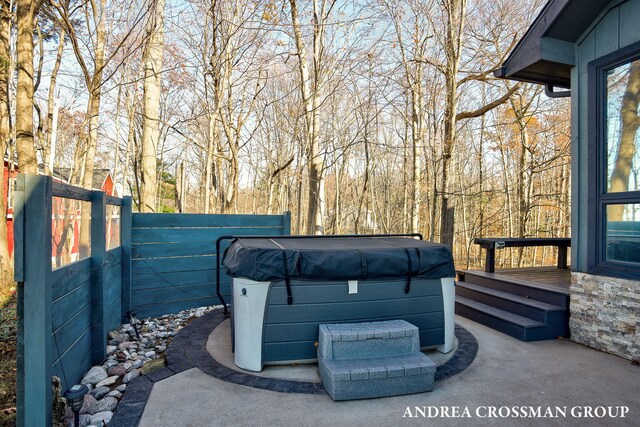 1155 Edgewater Ter, South Haven, MI 49090 - view of patio featuring a hot tub and a wooden deck