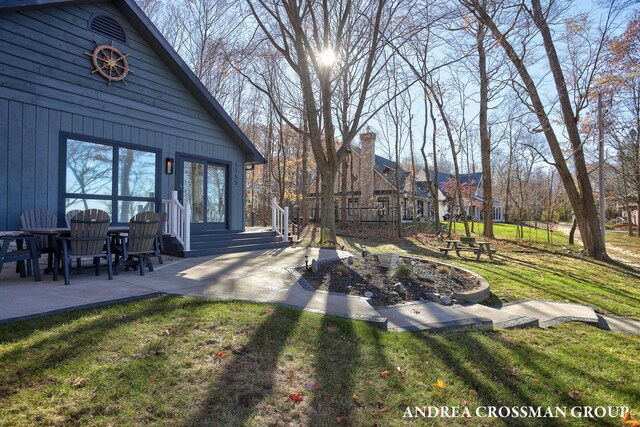 1155 Edgewater Ter, South Haven, MI 49090 - view of green lawn with a patio area