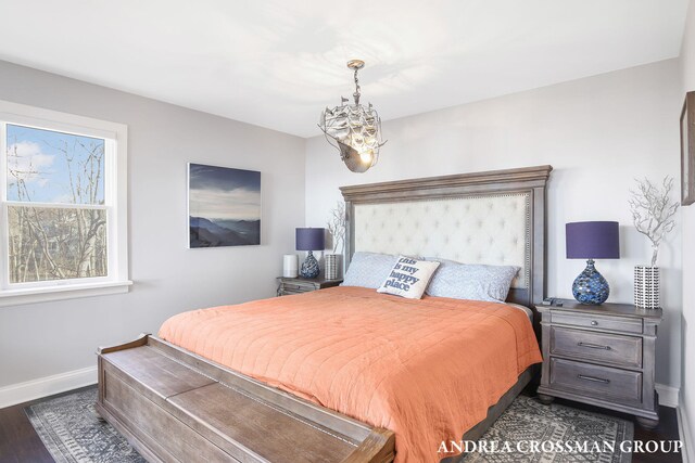 1155 Edgewater Ter, South Haven, MI 49090 - bedroom with baseboards, a chandelier, and wood finished floors