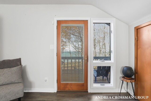 1155 Edgewater Ter, South Haven, MI 49090 - doorway featuring lofted ceiling, baseboards, and dark wood finished floors