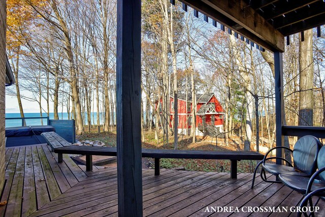 1155 Edgewater Ter, South Haven, MI 49090 - wooden deck featuring a water view and a covered hot tub