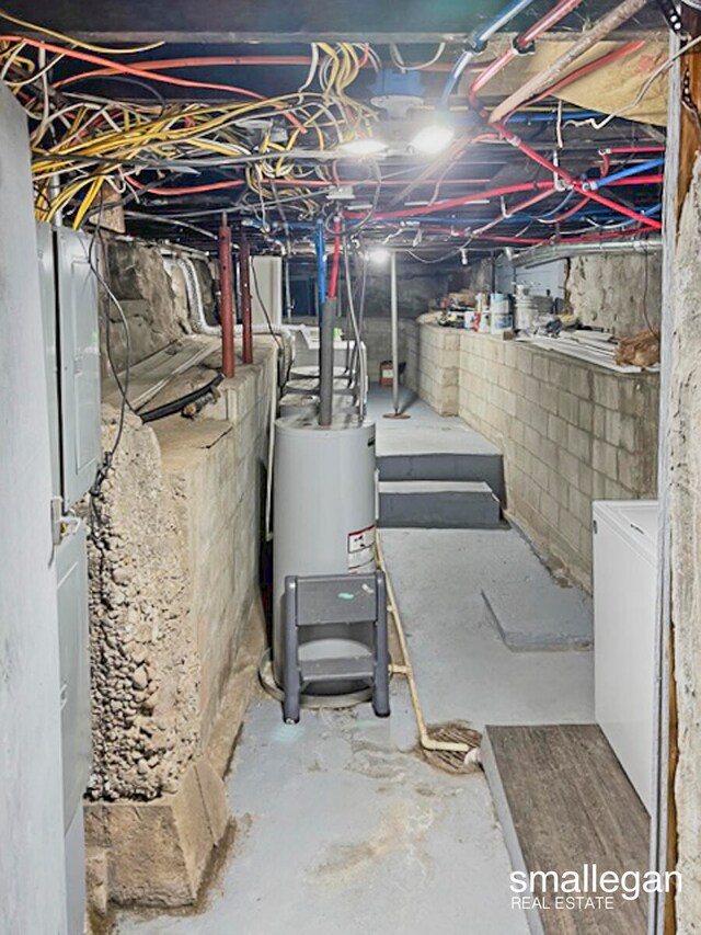 basement featuring water heater