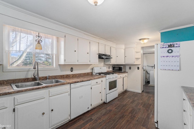 470 Michelson Rd, Houghton Lake, MI 48629 - kitchen featuring white appliances, under cabinet range hood, a sink, white cabinets, and dark wood-type flooring