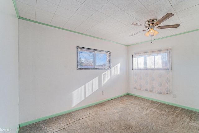 470 Michelson Rd, Houghton Lake, MI 48629 - carpeted spare room featuring ceiling fan and baseboards