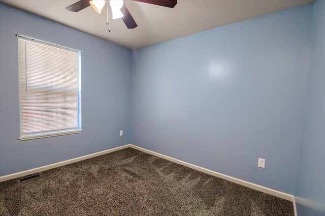 carpeted empty room with ceiling fan