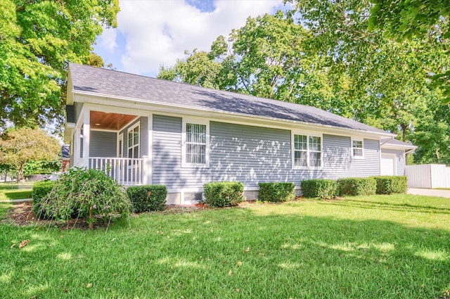 exterior space with a porch and a front yard