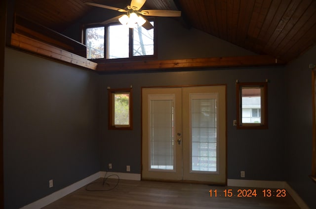 interior space with ceiling fan, french doors, wooden ceiling, hardwood / wood-style floors, and vaulted ceiling