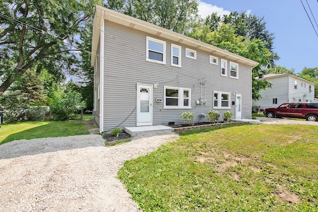 view of front of property with a front lawn