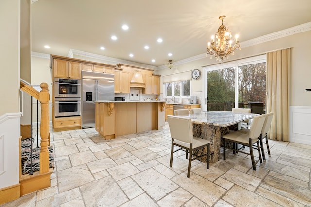 dining room featuring stairway, stone tile floors, recessed lighting, and ornamental molding