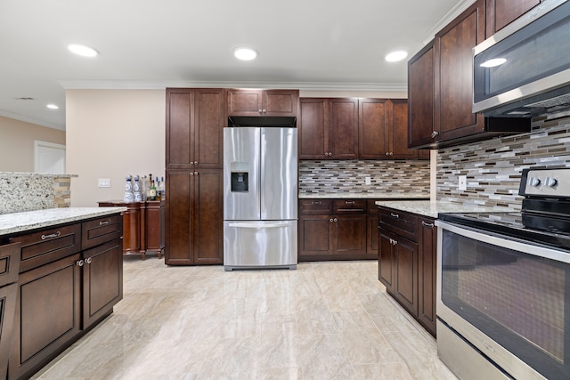 kitchen with light stone counters, stainless steel appliances, backsplash, and crown molding