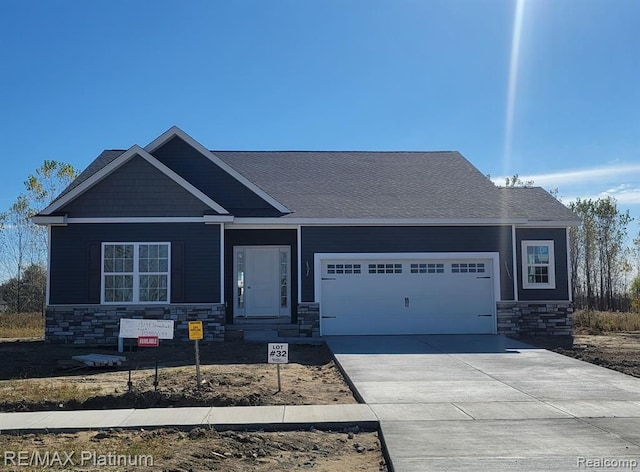 craftsman house with a garage