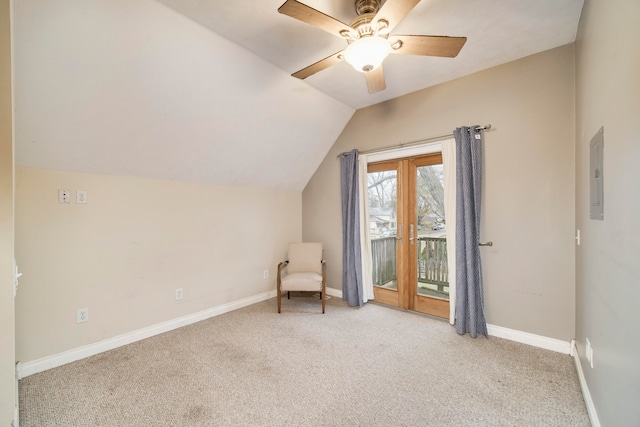 unfurnished room featuring light carpet, electric panel, ceiling fan, and lofted ceiling