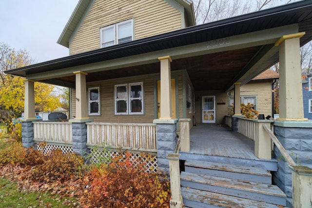 view of front of property featuring covered porch