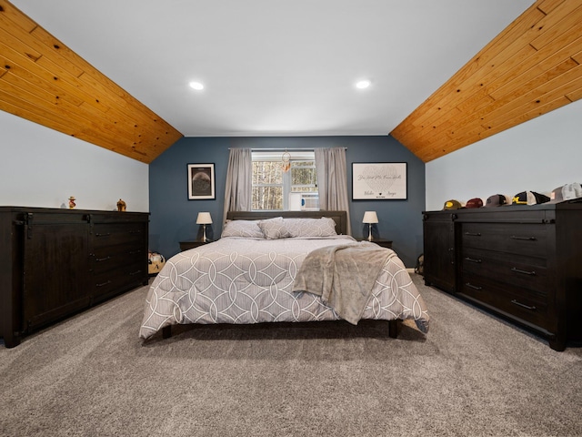 carpeted bedroom featuring lofted ceiling