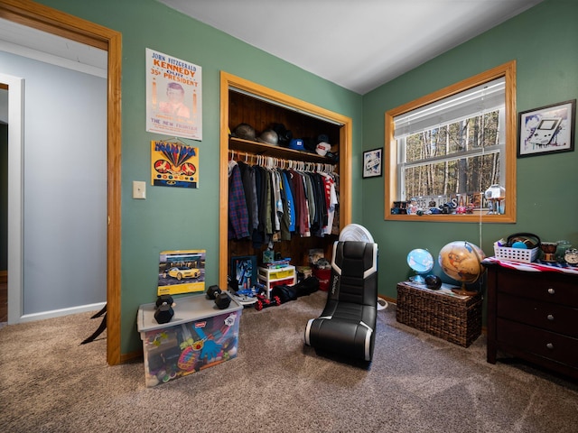 carpeted bedroom featuring a closet