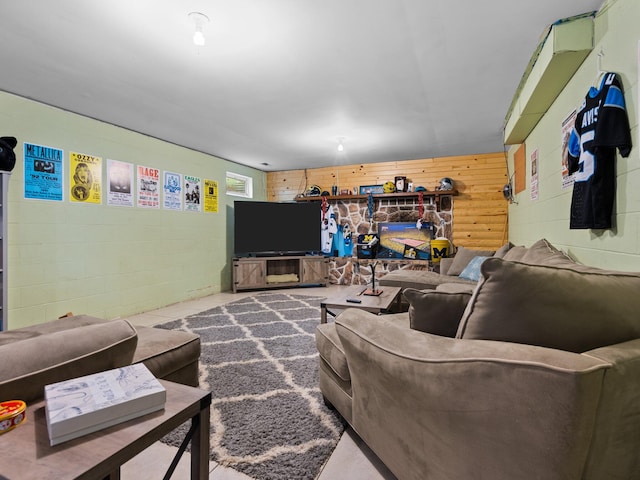 living room featuring wood walls