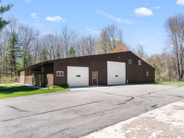 view of outdoor structure with a garage